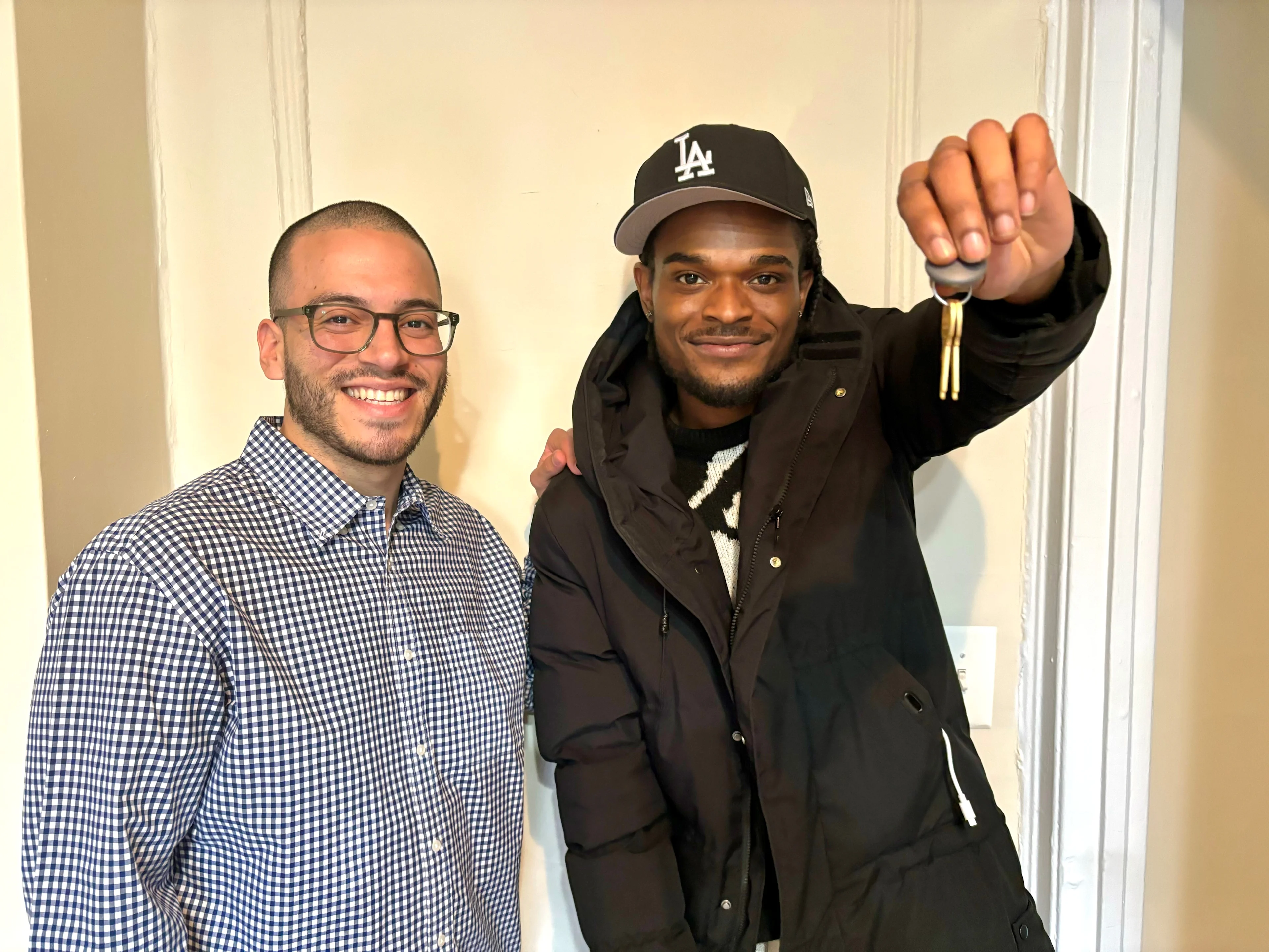 A guy showing keys