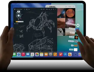 iPad Pro, space black colour, left hand holding device, right hand pointing gesturing to manipulate multiple open app windows, a drawing app with sketches of mechanical designs, photos library of planets and space images, downloads folder files fanned out