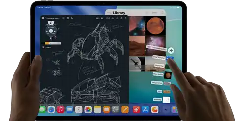 iPad Pro, space black colour, left hand holding device, right hand pointing gesturing to manipulate multiple open app windows, a drawing app with sketches of mechanical designs, photos library of planets and space images, downloads folder files fanned out