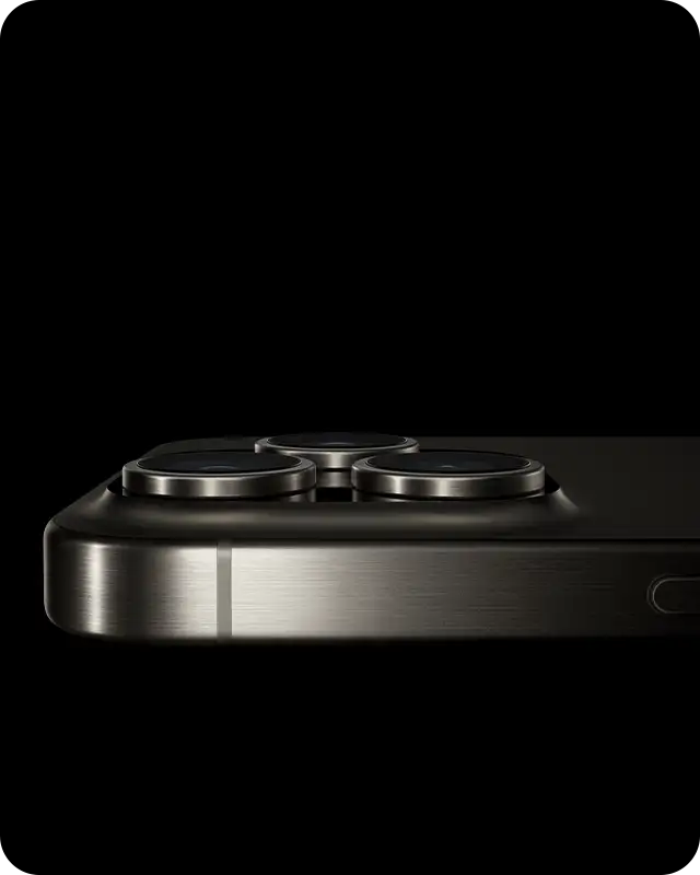 Side view of the top of the iPhone 15 Pro laying horizontally