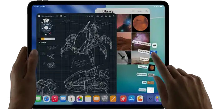 iPad Pro, space black colour, left hand holding device, right hand pointing gesturing to manipulate multiple open app windows, a drawing app with sketches of mechanical designs, photos library of planets and space images, downloads folder files fanned out