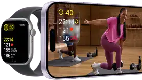 Apple Watch à côté d’un iPhone affichant une séance Apple Fitness+