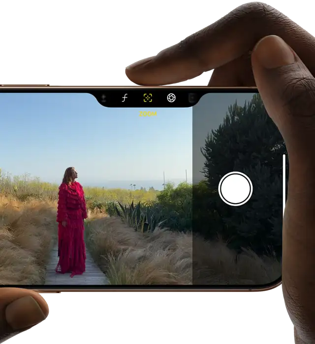 Commande de la caméra sur iPhone 16 Pro, l’index de la main droite glisse sur le côté du téléphone pour ajuster la profondeur de champ