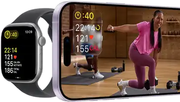 Apple Watch à côté d’un iPhone affichant une séance Apple Fitness+