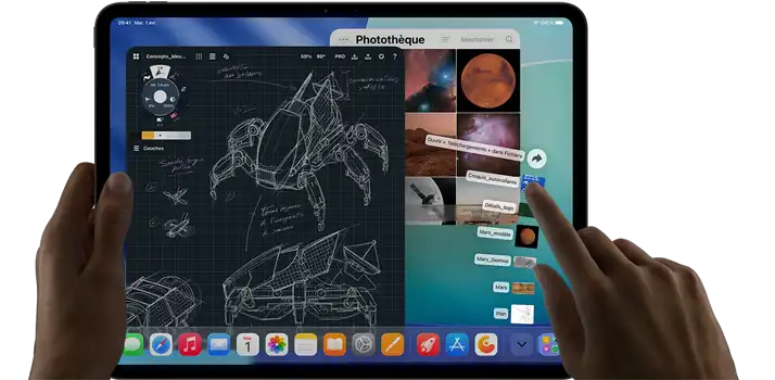iPad Pro, noir infini, main gauche tenant l’appareil, main droite pointant du doigt pour manipuler de multiples fenêtres d’apps, app de dessin avec des croquis d’engins mécaniques, photothèque avec des images de planètes et de l’espace, dossier Téléchargements avec fichiers déployés