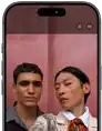 iPhone 17 Pro front screen showing Center Stage for photos feature and how to take a Selfie of a group of people, with their faces highlighted