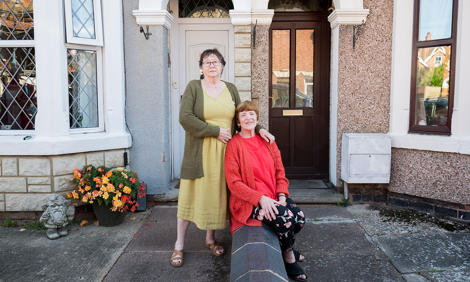 WHO DOORS WINS: Neighbour pals Gill (left) and Pauline are planning a postcode party