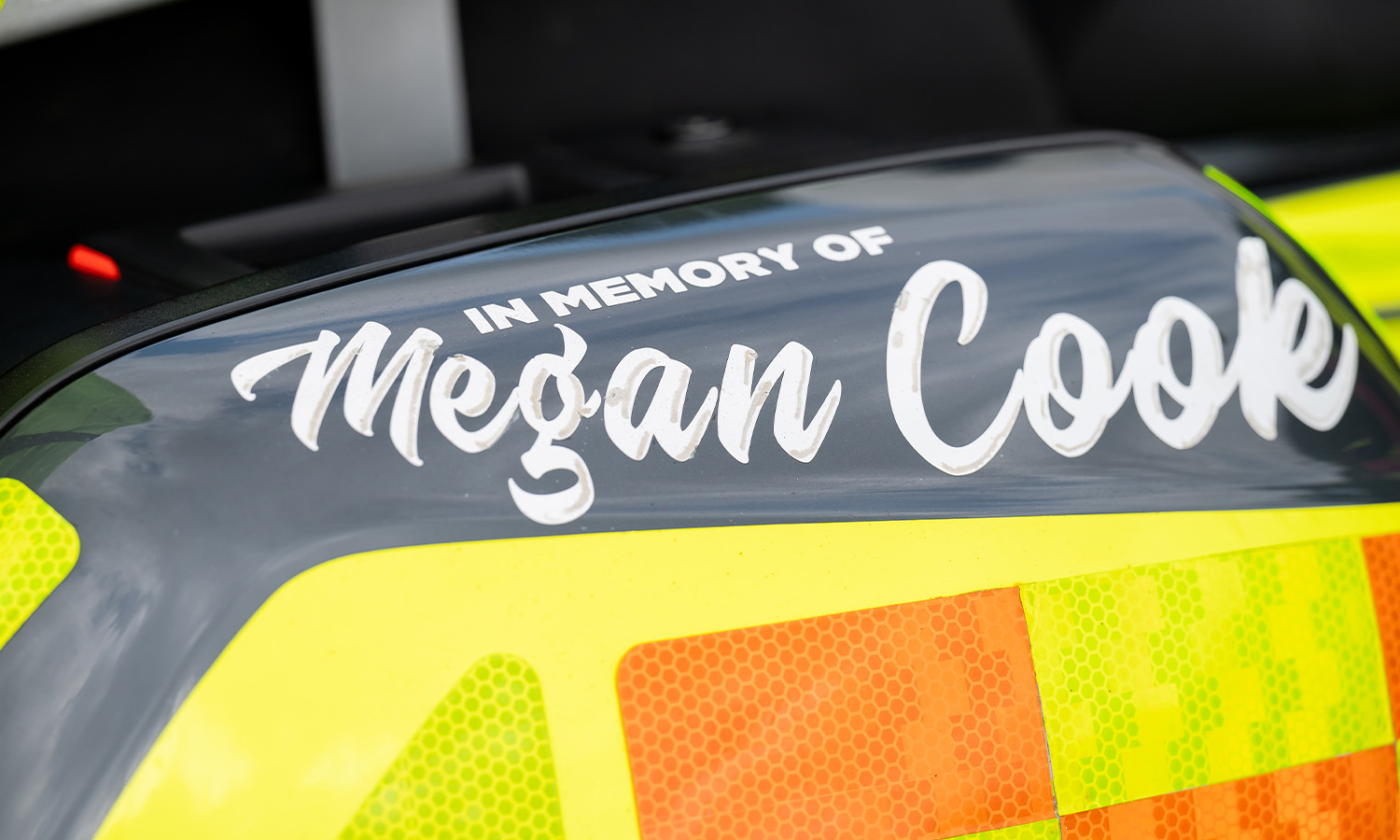 The tribute to Megan on Stephen's bike reads: "In memory of Megan Cook"