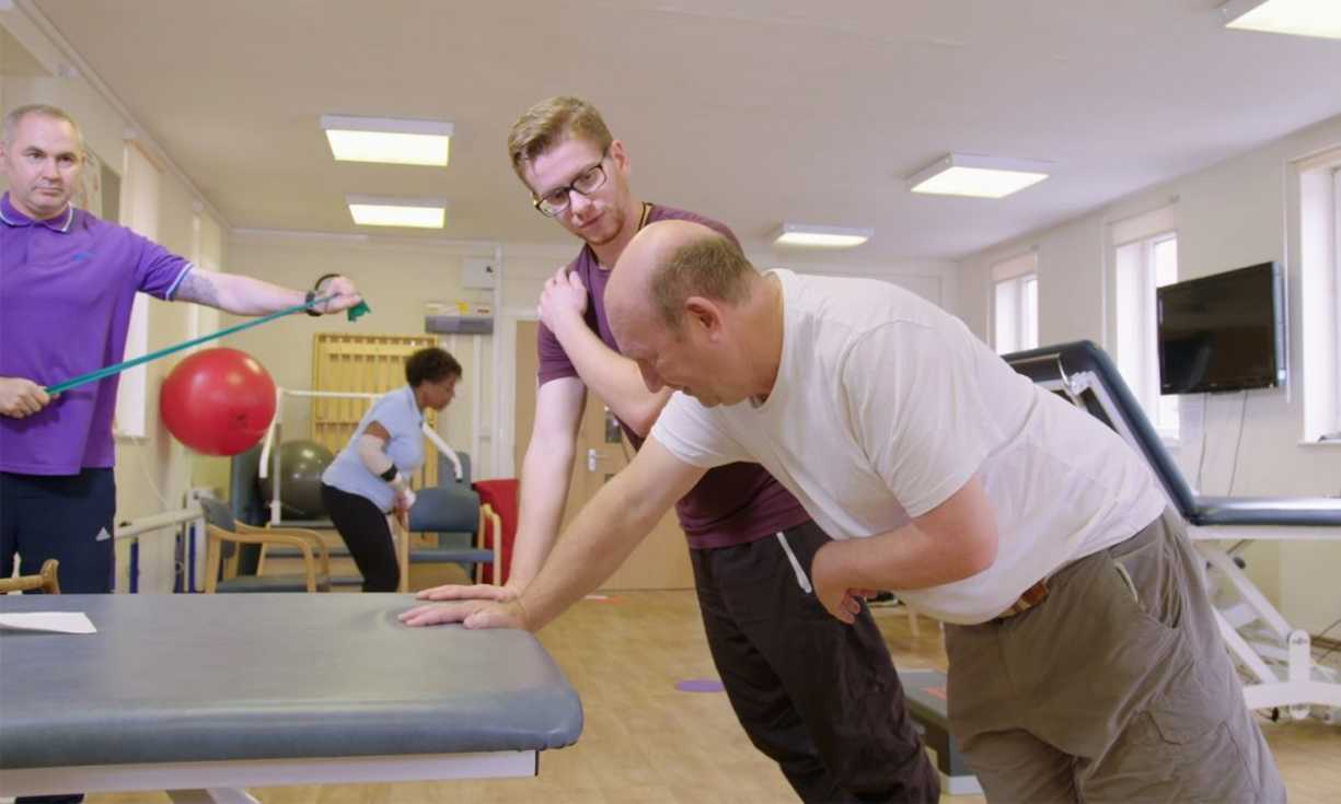 Service users take part in physical activities at the INS gym facility