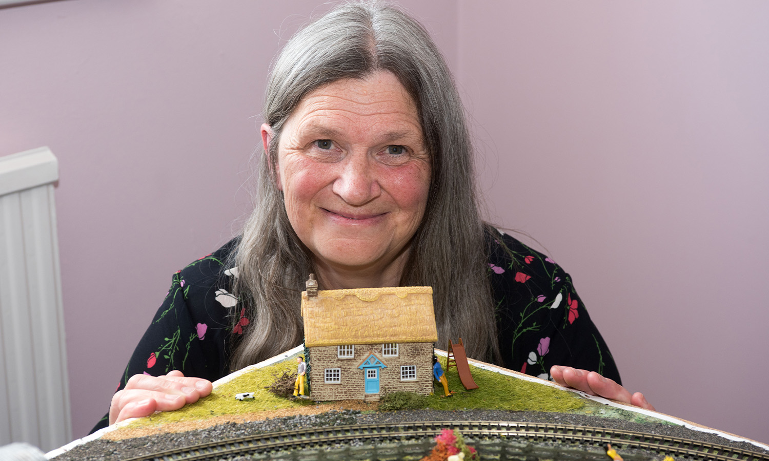 HOME SWEET HOME: Sally with model of dream cottage she'd love