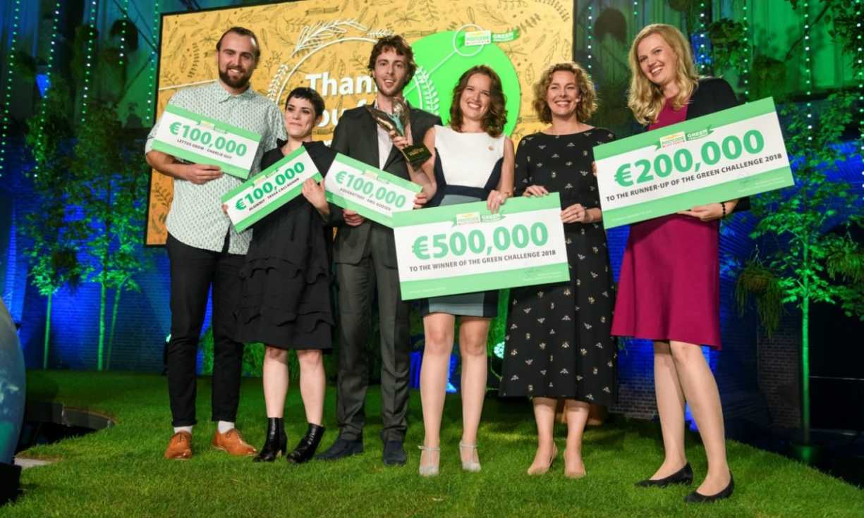 The Green Challenge finalists from 2018 with their cheques, with prize money ranging from €100,000 to €500,000