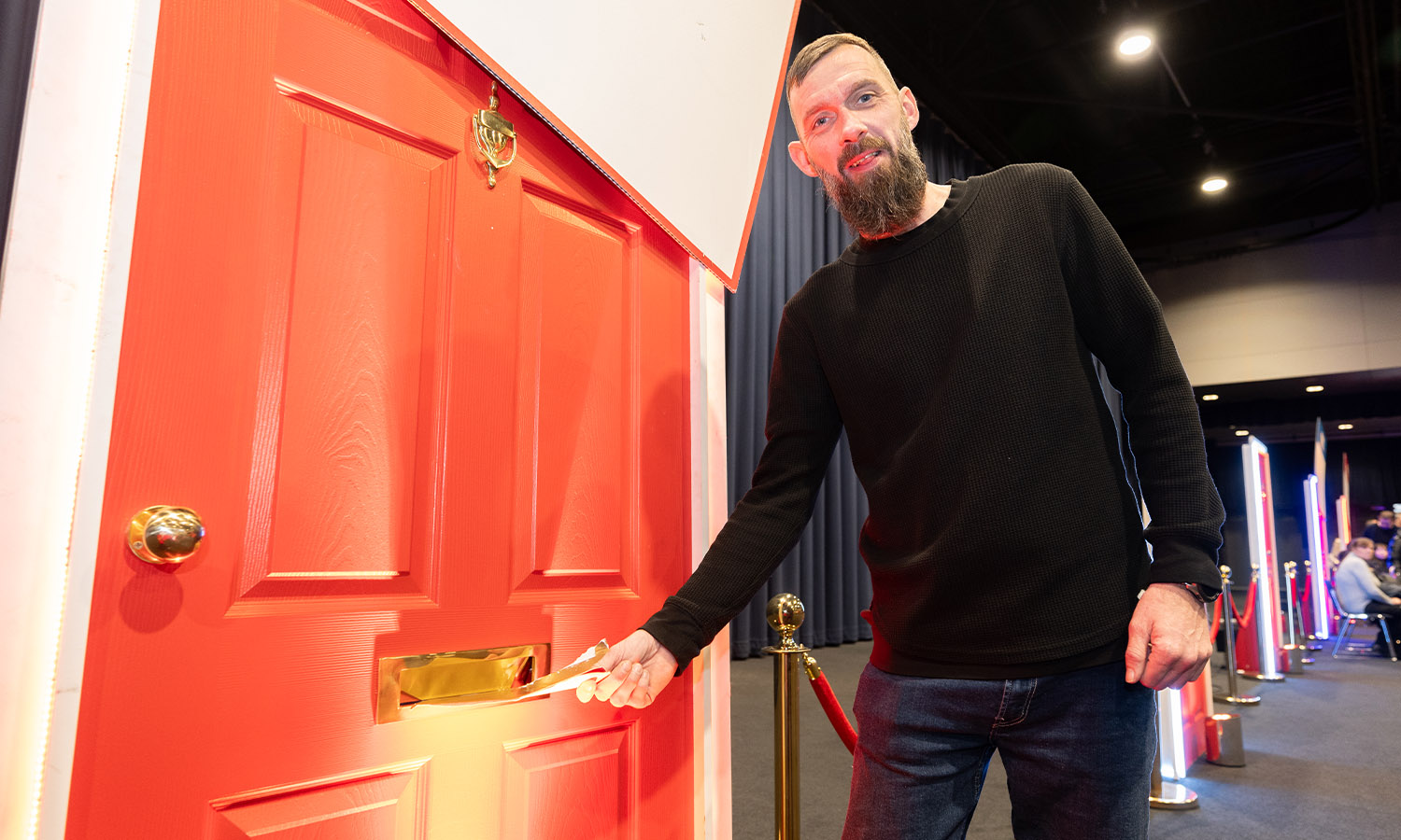 POSTMAN'S SHOCK: Andrew helped deliver golden envelopes - and won himself