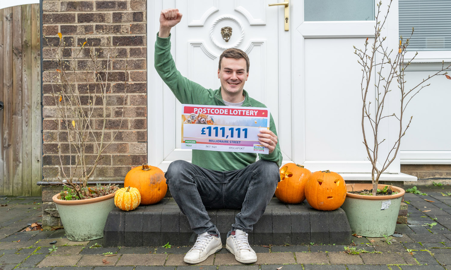 IT'S HALLO-WIN: Lee celebrates prize among his kids' pumpkins