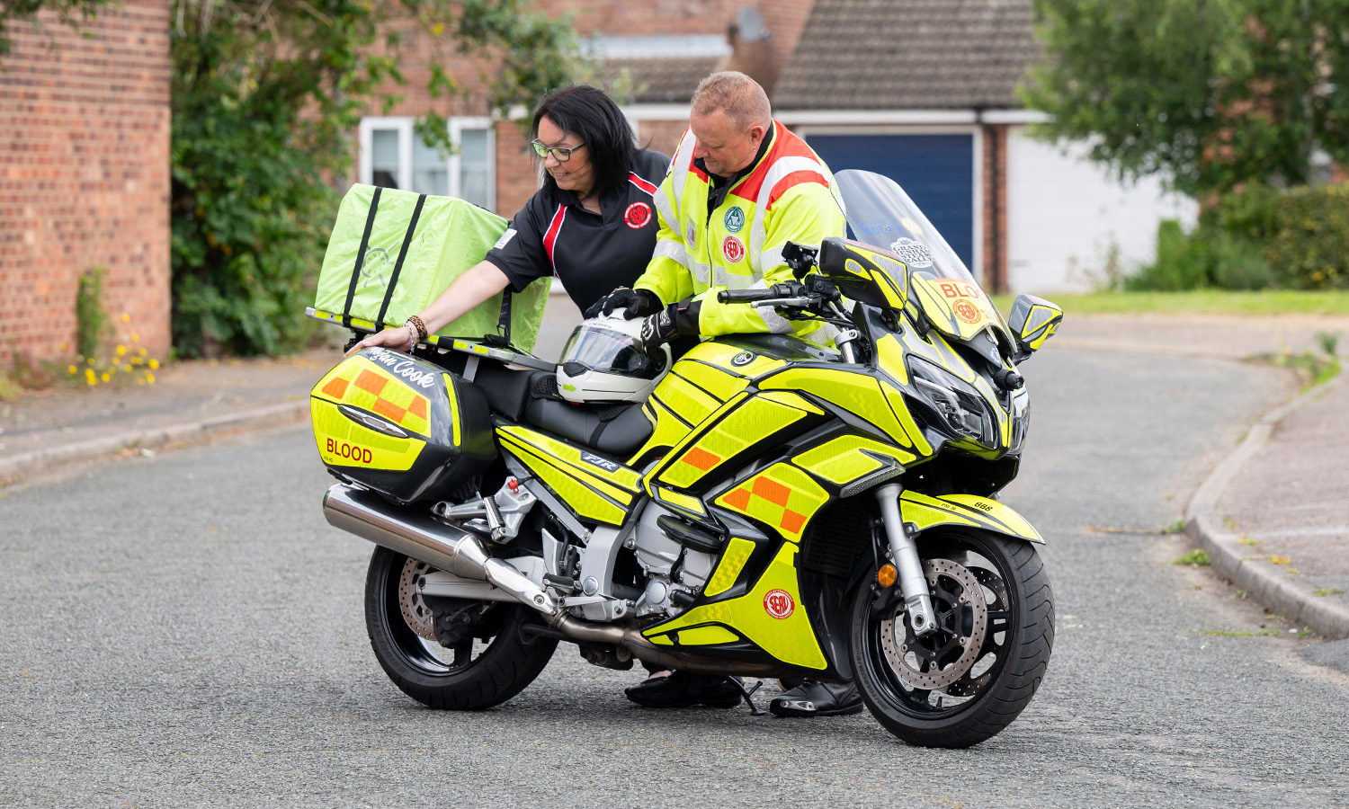 Maria and Stephen alongside the bike named in Megan's honour