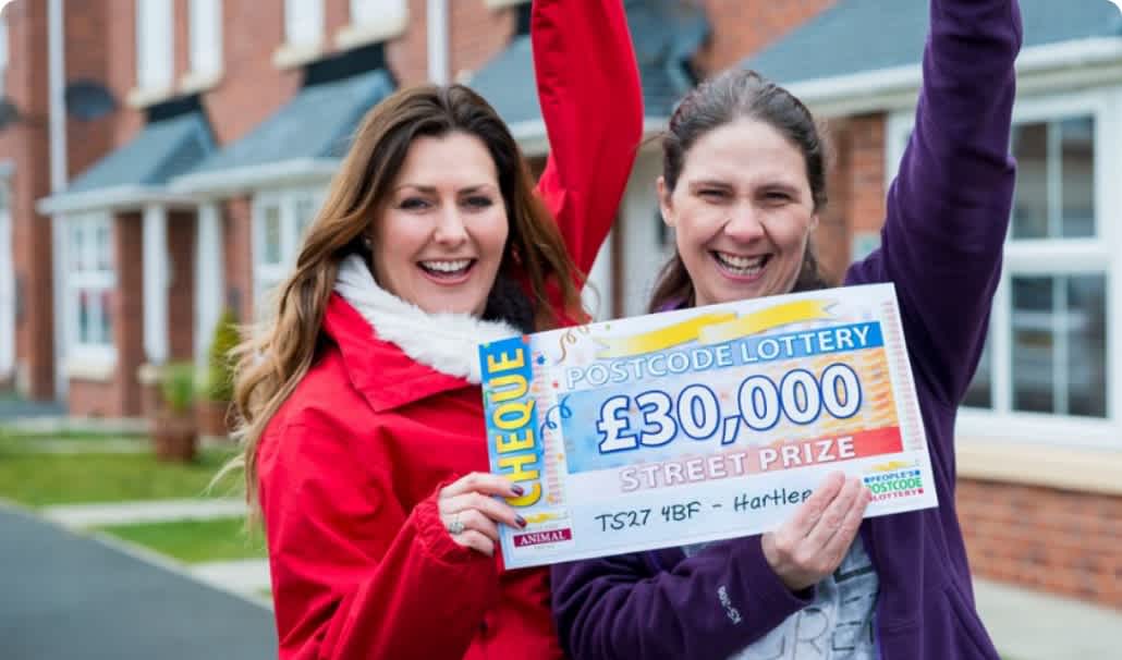 Seven of the happy Hartlepool winners and their fabulous £30,000 cheques