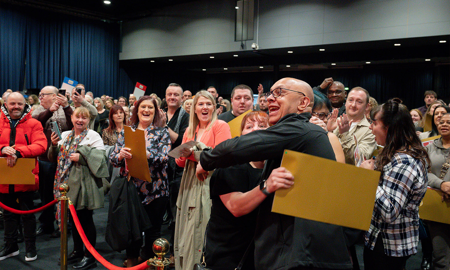 CLINCHED IT: Michelle and Brett hug when they realise she's a big winner