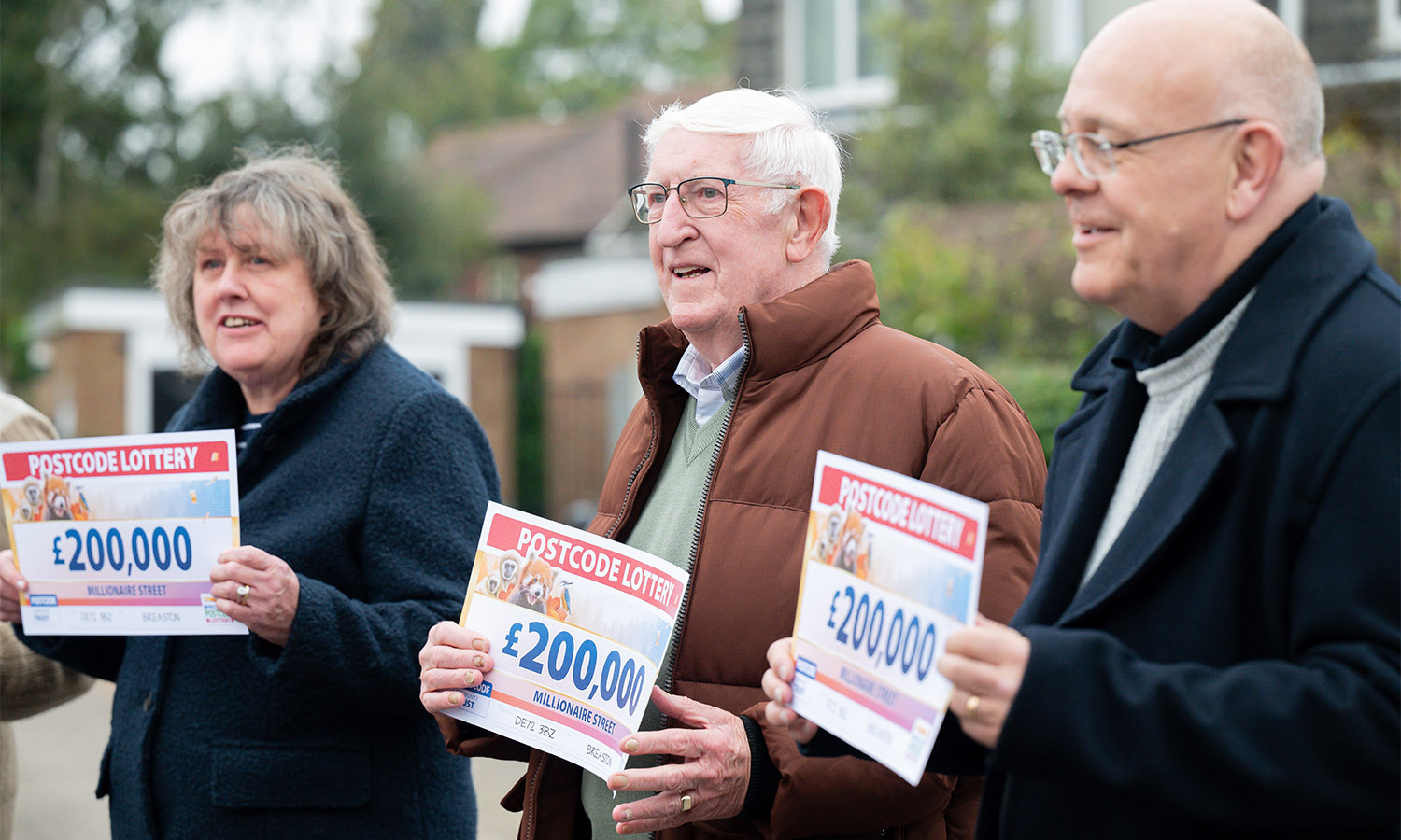 THREE IN A ROW: Next-door neighbours celebrate winning together