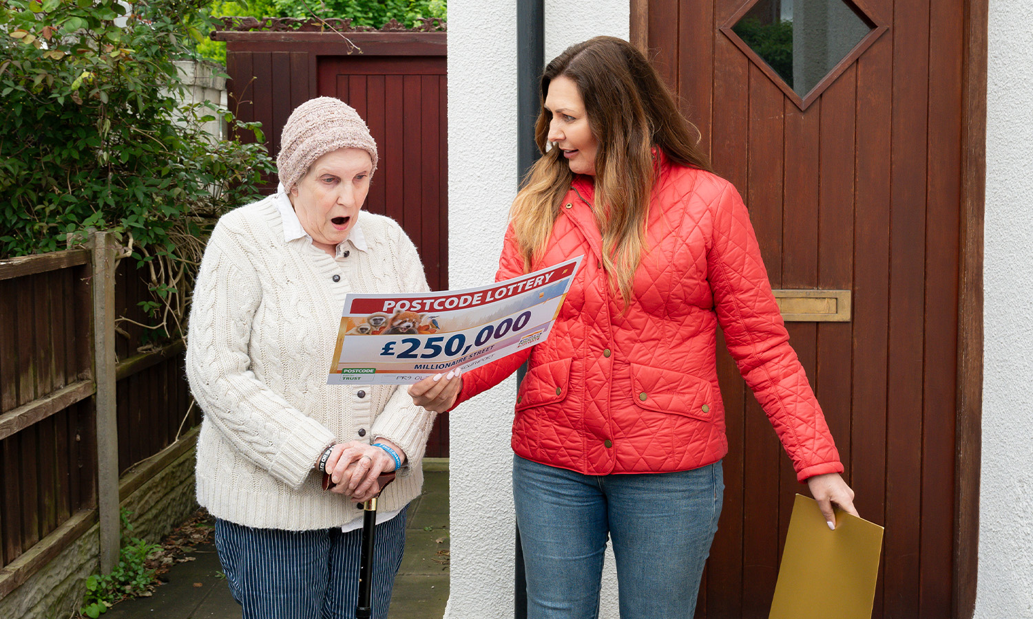 CHEQUE IT OUT: Maureen's shock when Presenter Judie McCourt unveils her prize