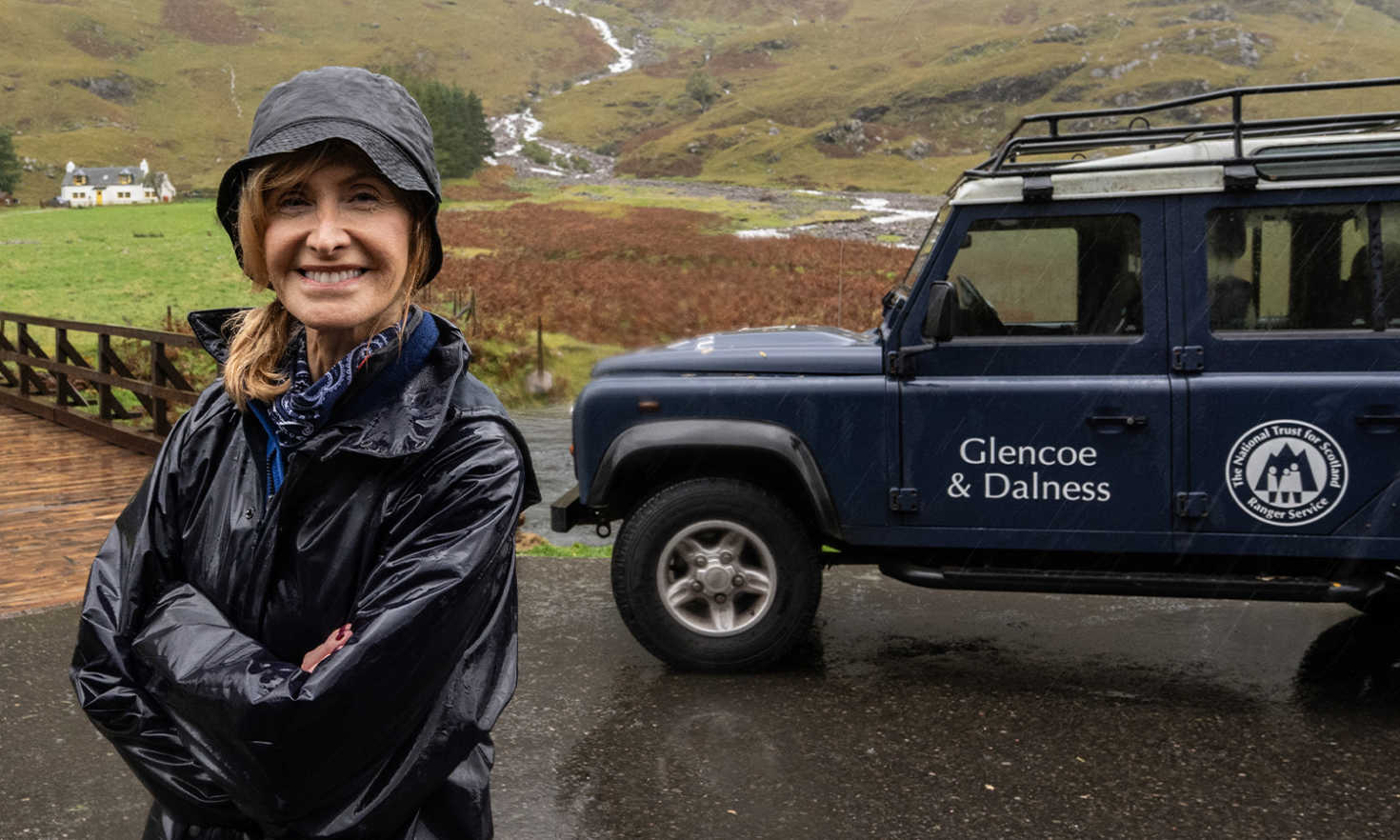 New National Trust for Scotland President, Jackie Bird, 'drinks in' the Glencoe weather. Photograph: Iain Ferguson, The Write Image