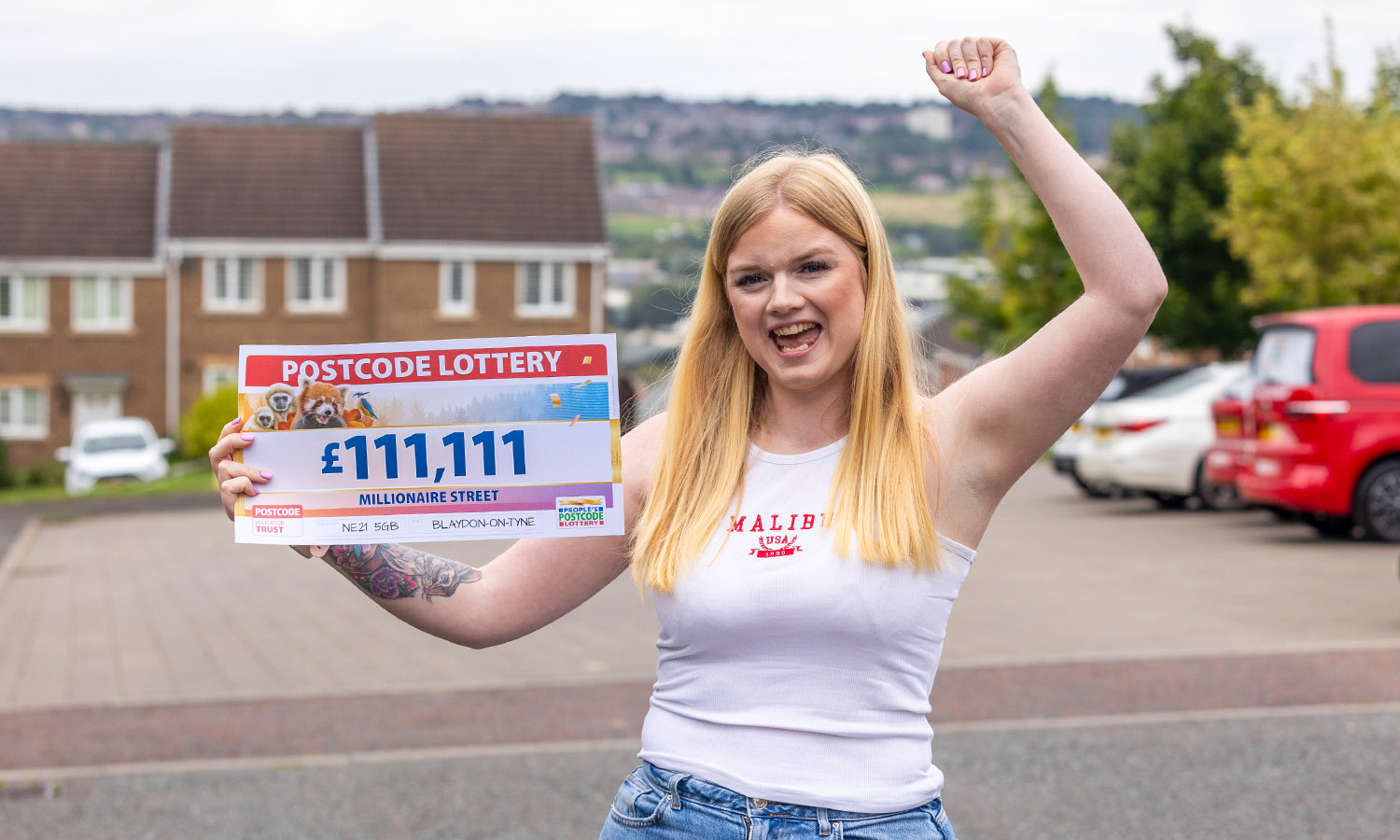 PLEASED AS PUNCH: Christina shows off her winnings