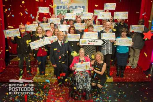 Happy winners in Basildon celebrate with their life-changing cheques