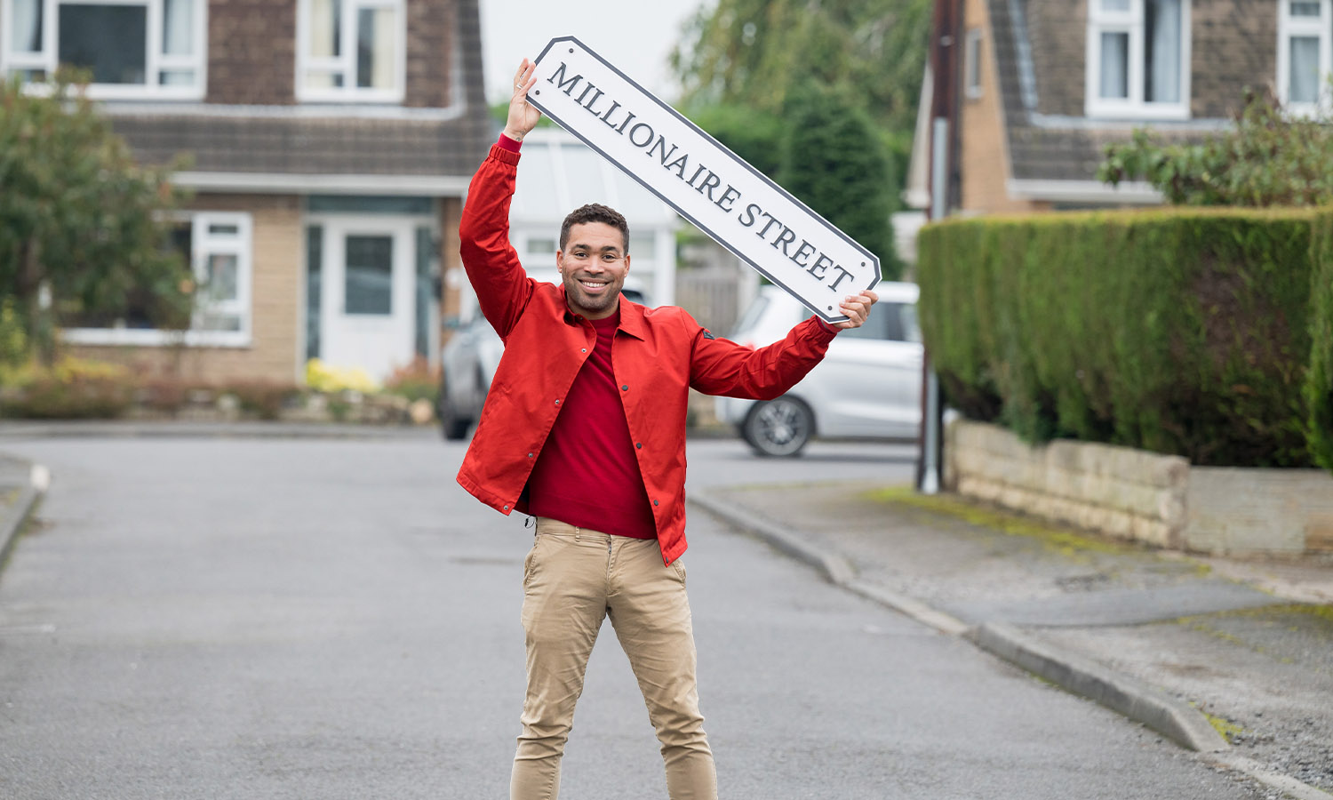 BUMPER NEW YEAR: Postcode Lottery's Danyl Johnson congratulated our winners