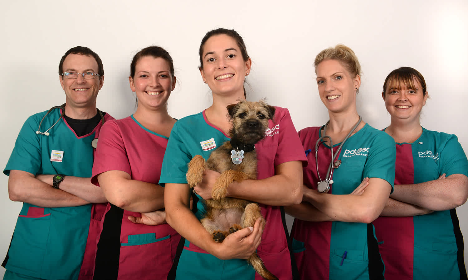 Members of PDSA's new Vet Squad with Penny the dog