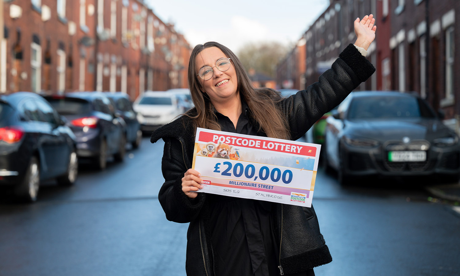 CHEQUE IT OUT: Buzzing Beth always said she'd land a Postcode Lottery win