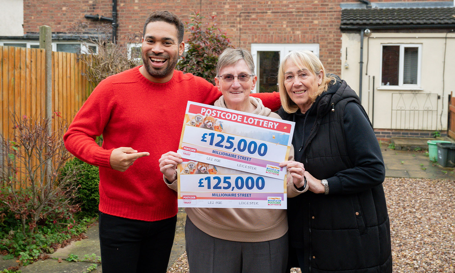 CHEQUE MATES: Pauline celebrates her win with pal Sharon and Danyl