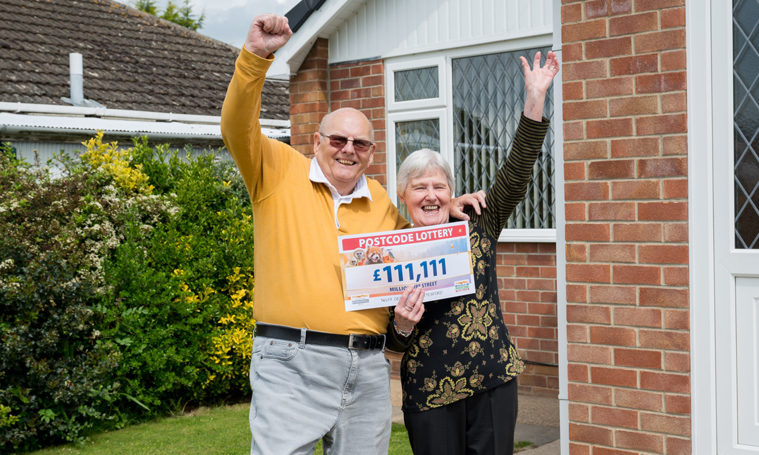 Geoffrey and wife Jenny celebrate after his £111,111 win