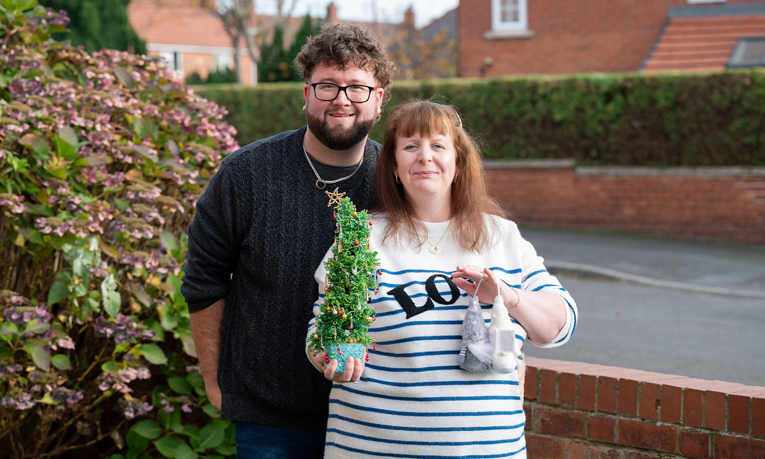 TREE-MENDOUS: Lindsey and Liam with some of her Christmas ornaments