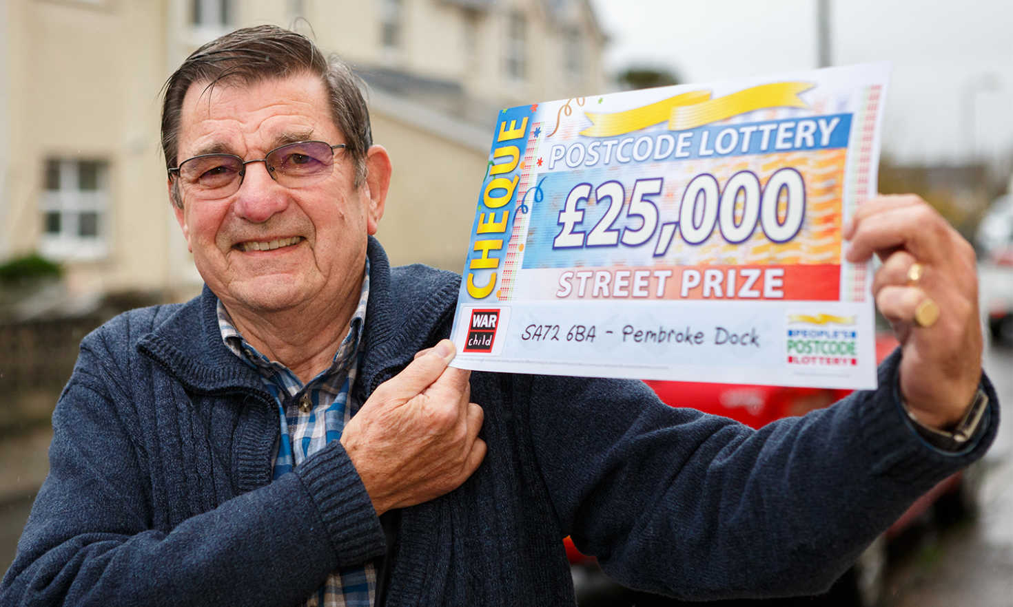 Pembroke Dock winner William was pleased to receive his fabulous £25,000 cheque