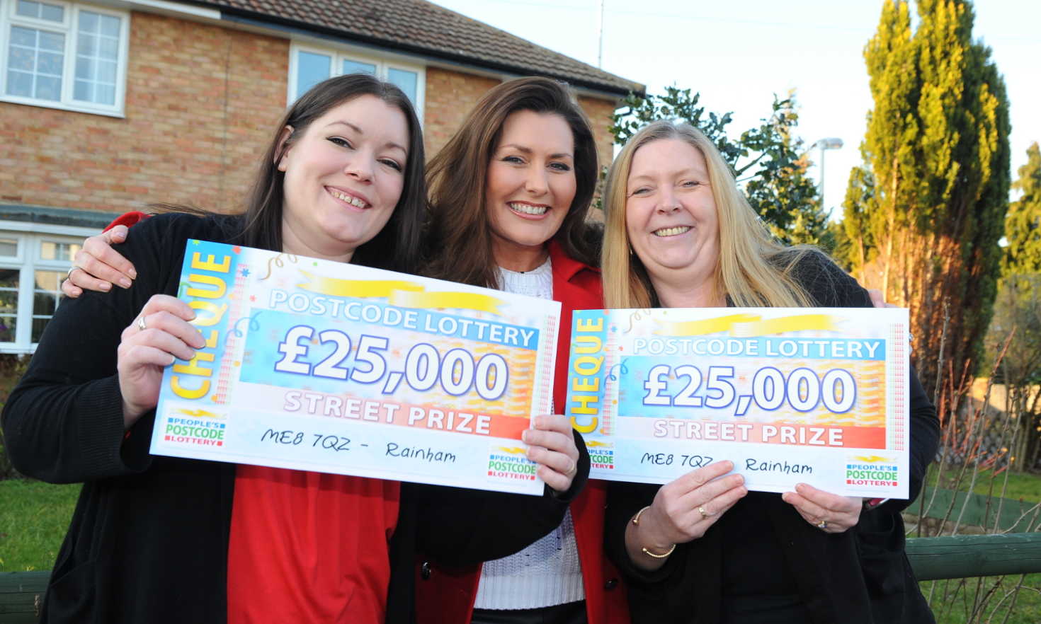 Rainham £25,000 winners Mary and Jacqueline, along with People's Postcode Lottery presenter Judie McCourt