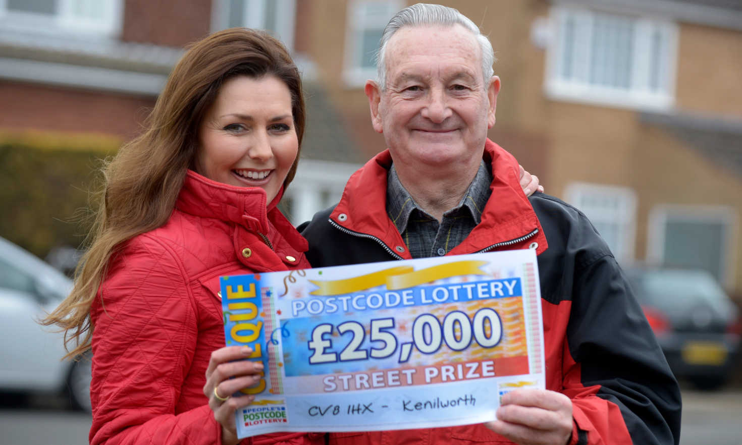 Our £25,000 Kenilworth winner Derrick Ward alongside People's Postcode Lottery presenter Judie McCourt