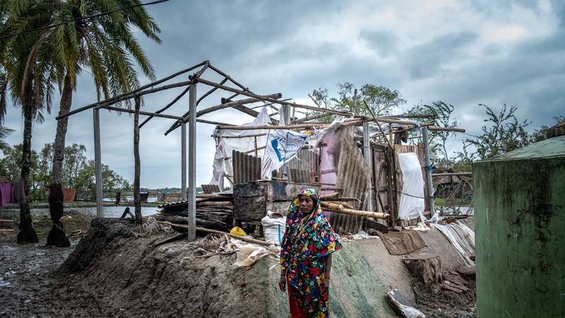 Asia - Bangladesh - Cyclone Amphan - women outside destroyed home