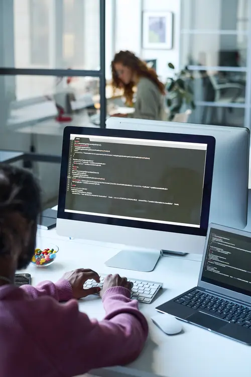 man-working-with-codes-on-computer