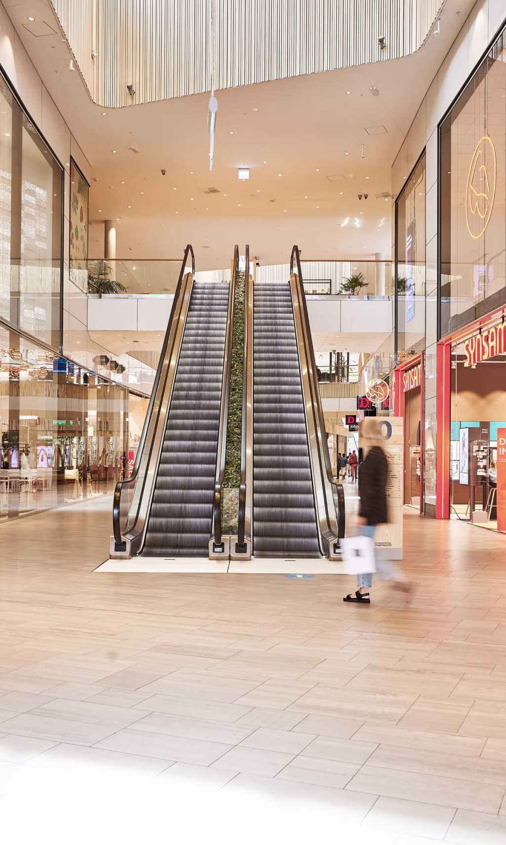 Escalators in shopping centre 
