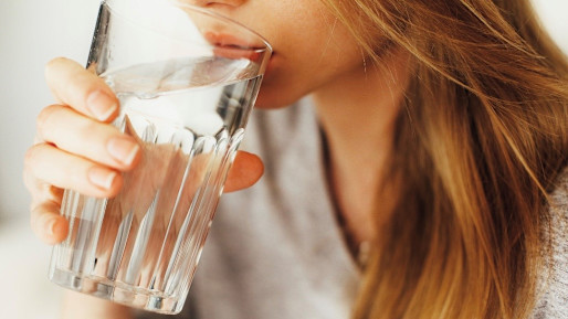 The girl drinks water