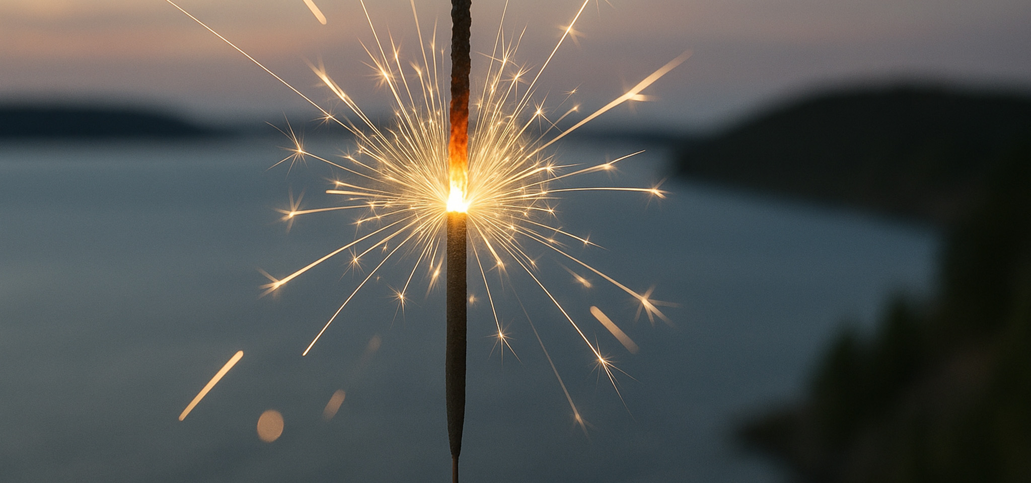 Fireworks light up the sky over a forested lakeshore, with a modern wooden house and terrace in the foreground overlooking the water.