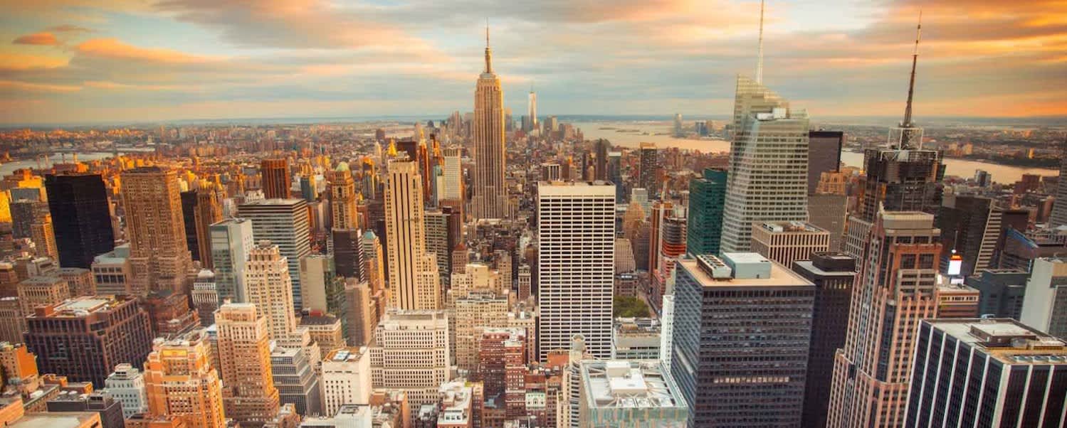 An aerial shot of the New York City skyline at dusk.