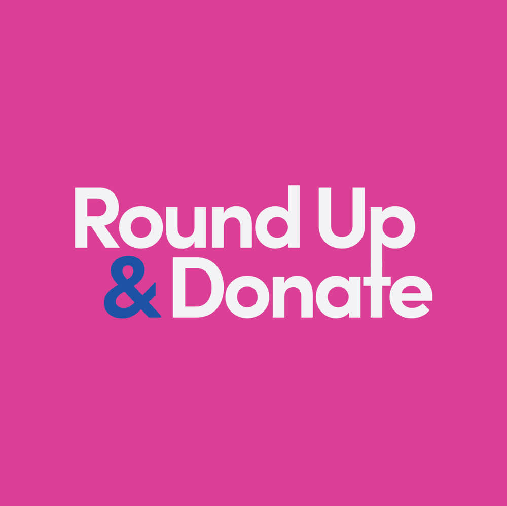 Round Up & Donate written in white on a pink background.