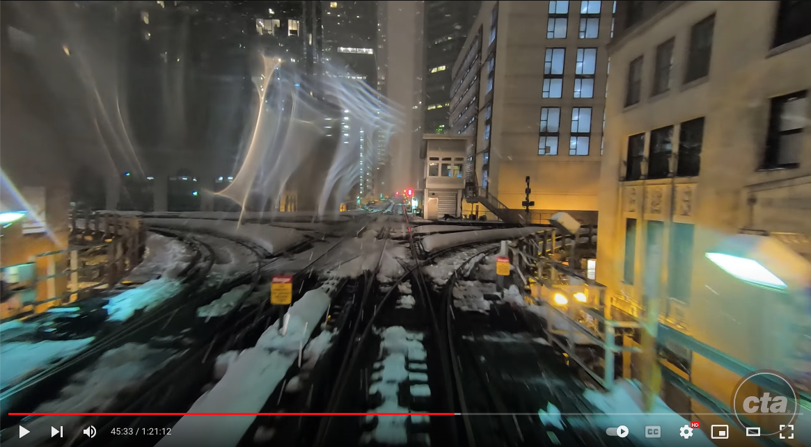 Image of a YouTube still of Chicago El train tracks in winter.