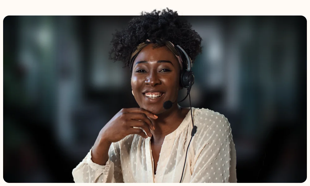 Portrait of a professional in a softly blurred office, illustrating the TestGorilla article "The ultimate guide to candidate sourcing for recruiters"