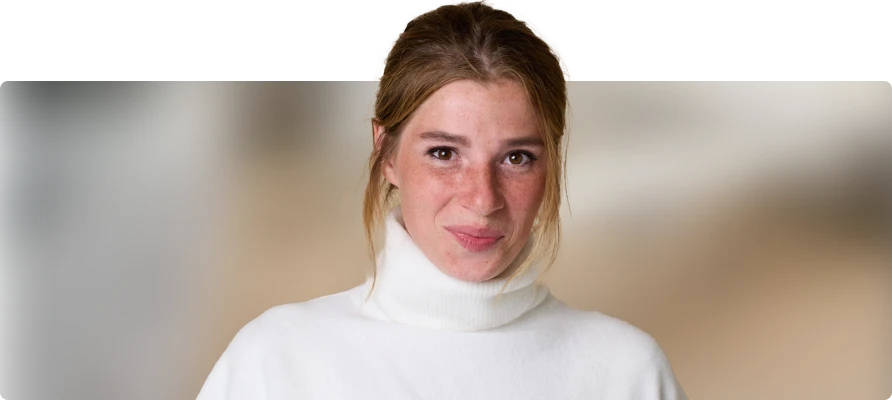 Woman wearing a white turtleneck