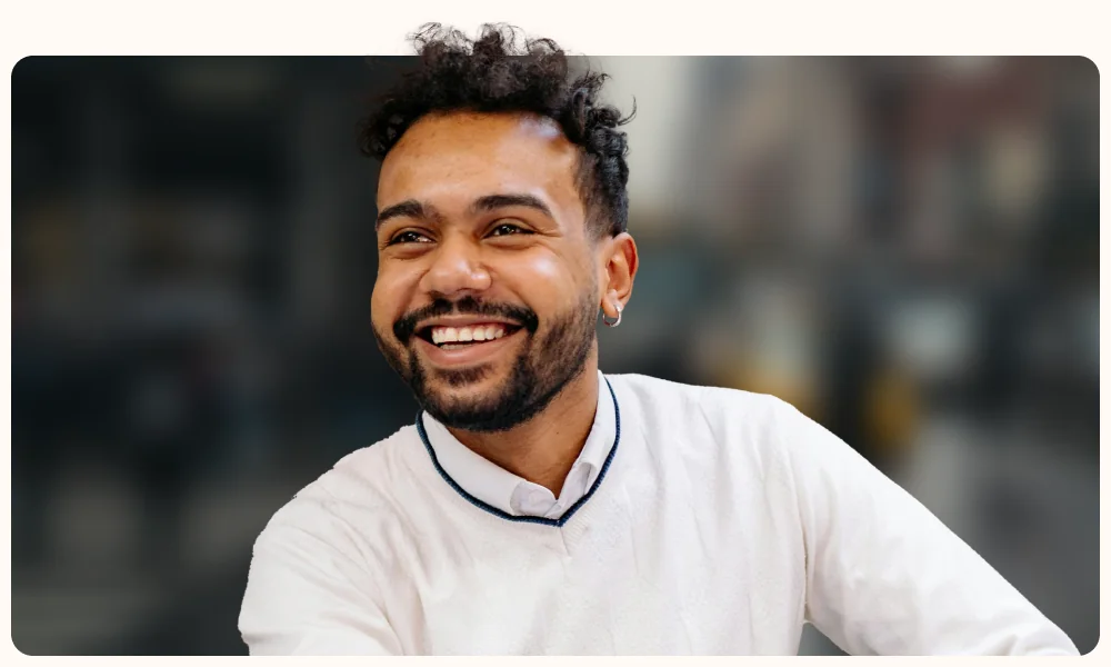 Portrait of a professional on a softly blurred city street, illustrating the TestGorilla article "Your guide to the snowflake test and why to avoid it in hiring"