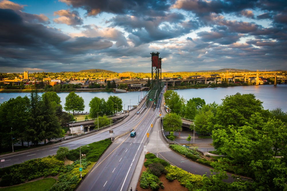 Evening view of the Williamette River and Hawthorne Bridge, in Portland, Oregon.