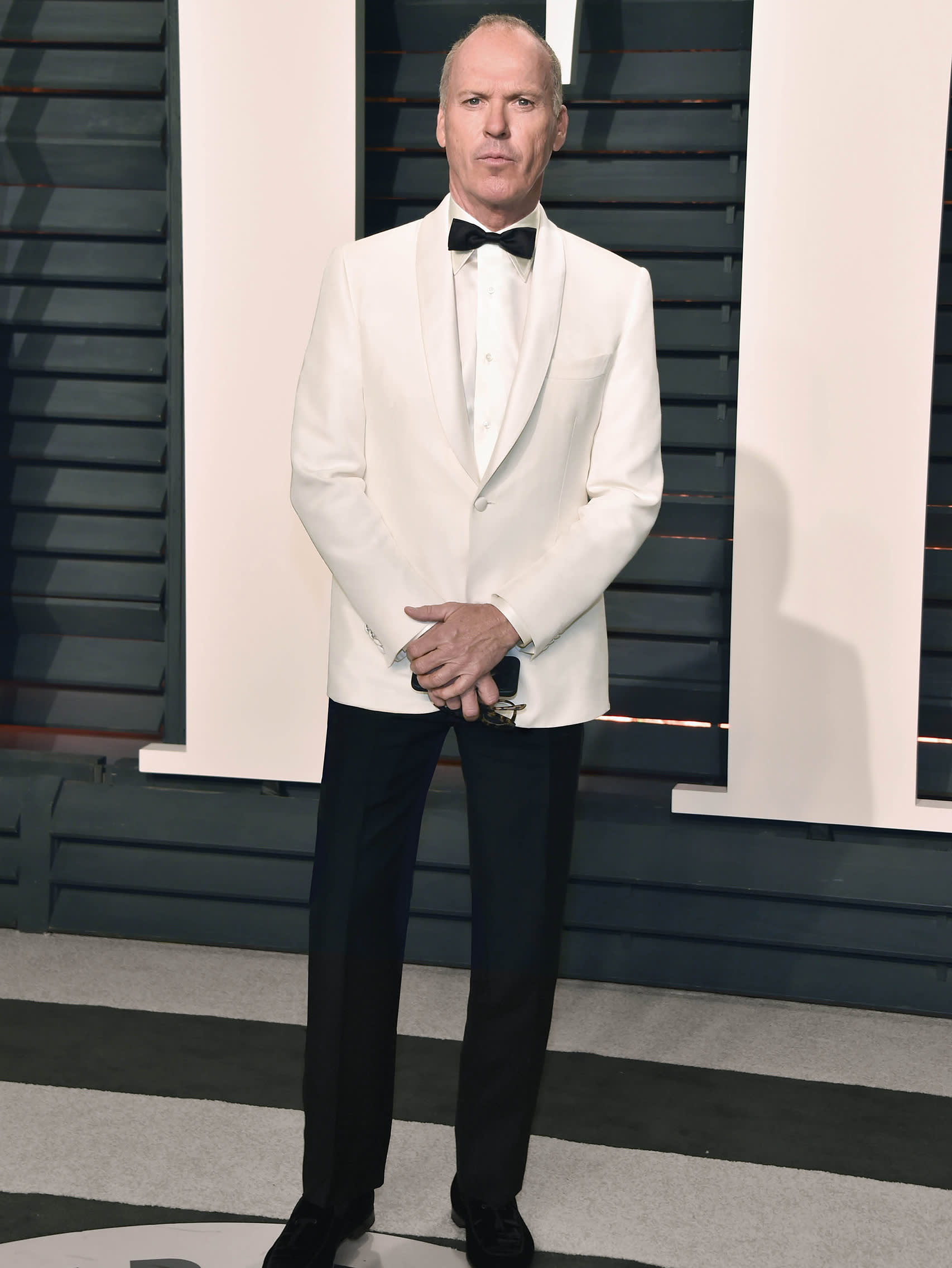 Michael Keaton wearing a Brioni bespoke tuxedo