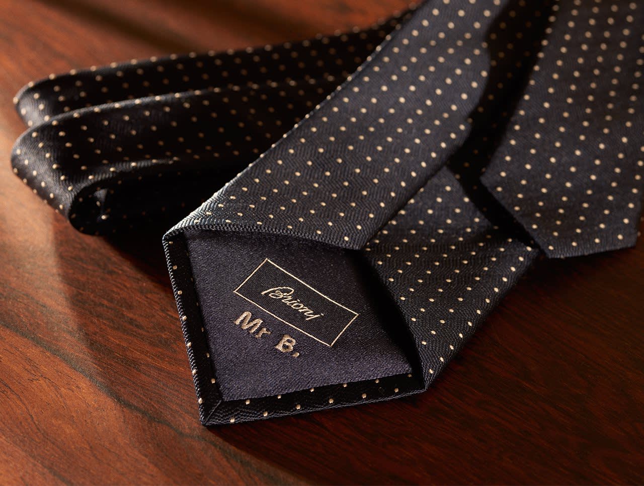 A Brioni made-to-order tie with customised monogram