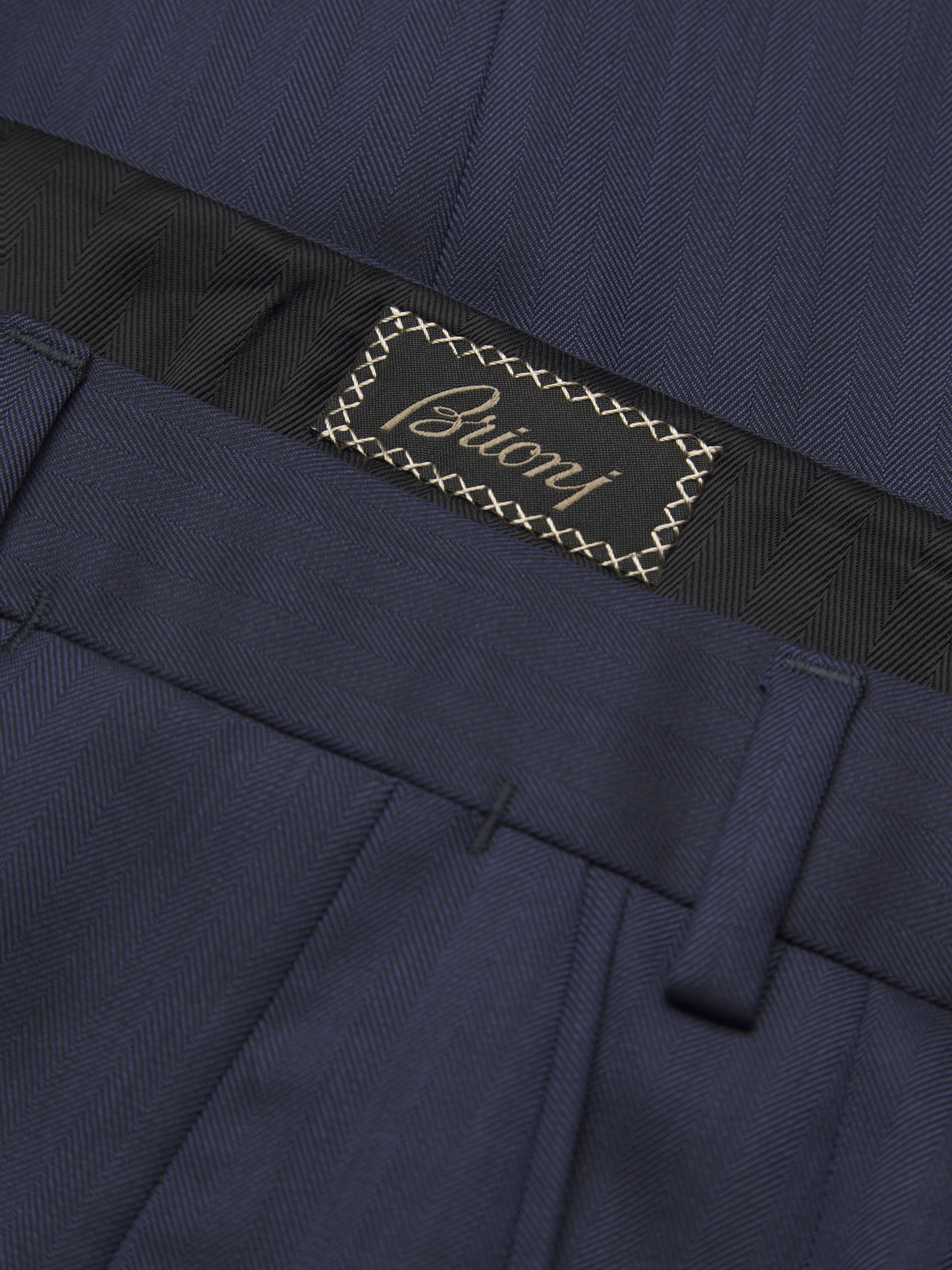 Navy blue herringbone Super 150's responsible wool Brunico suit