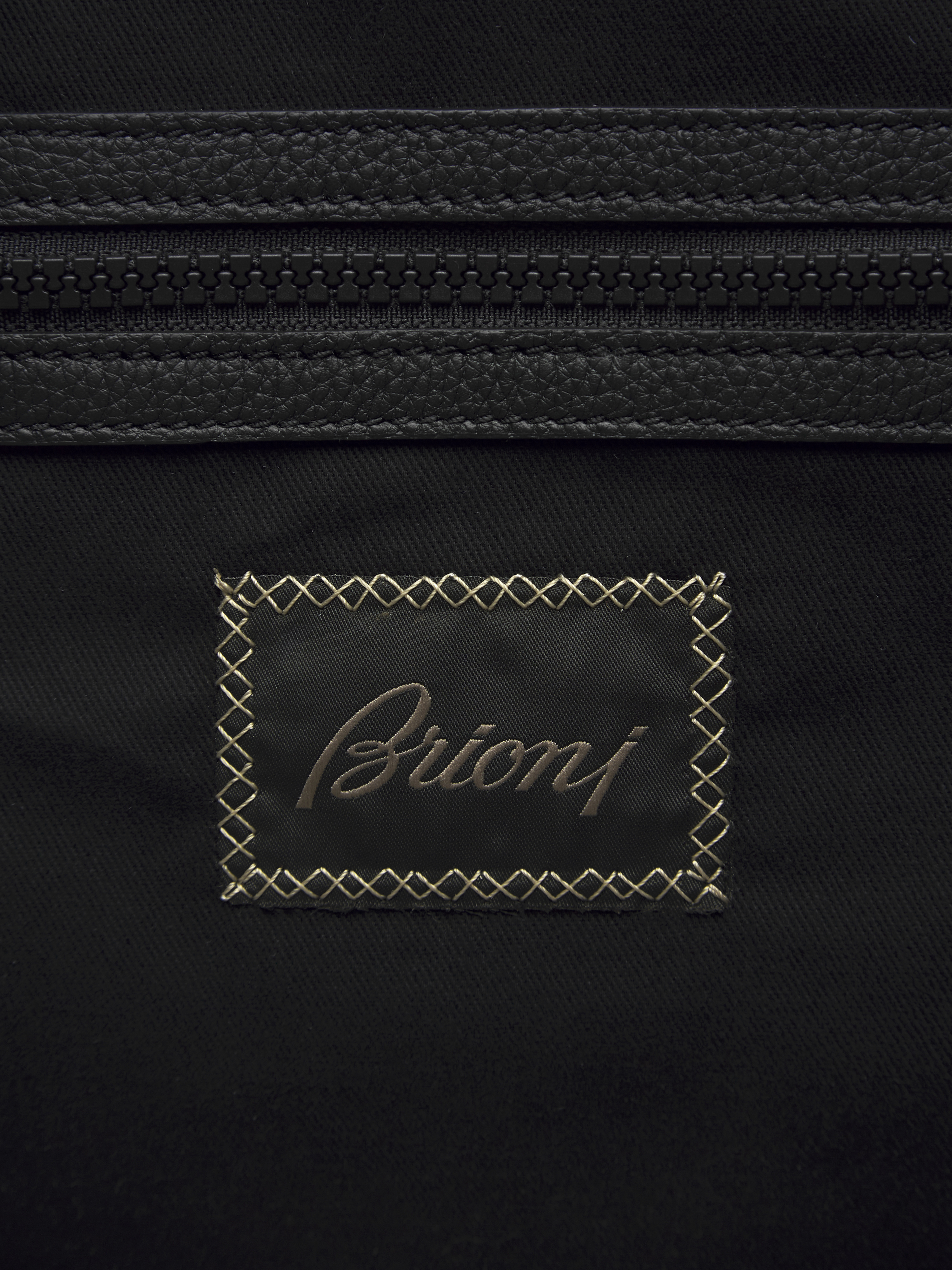 Black nylon and grained leather city bag